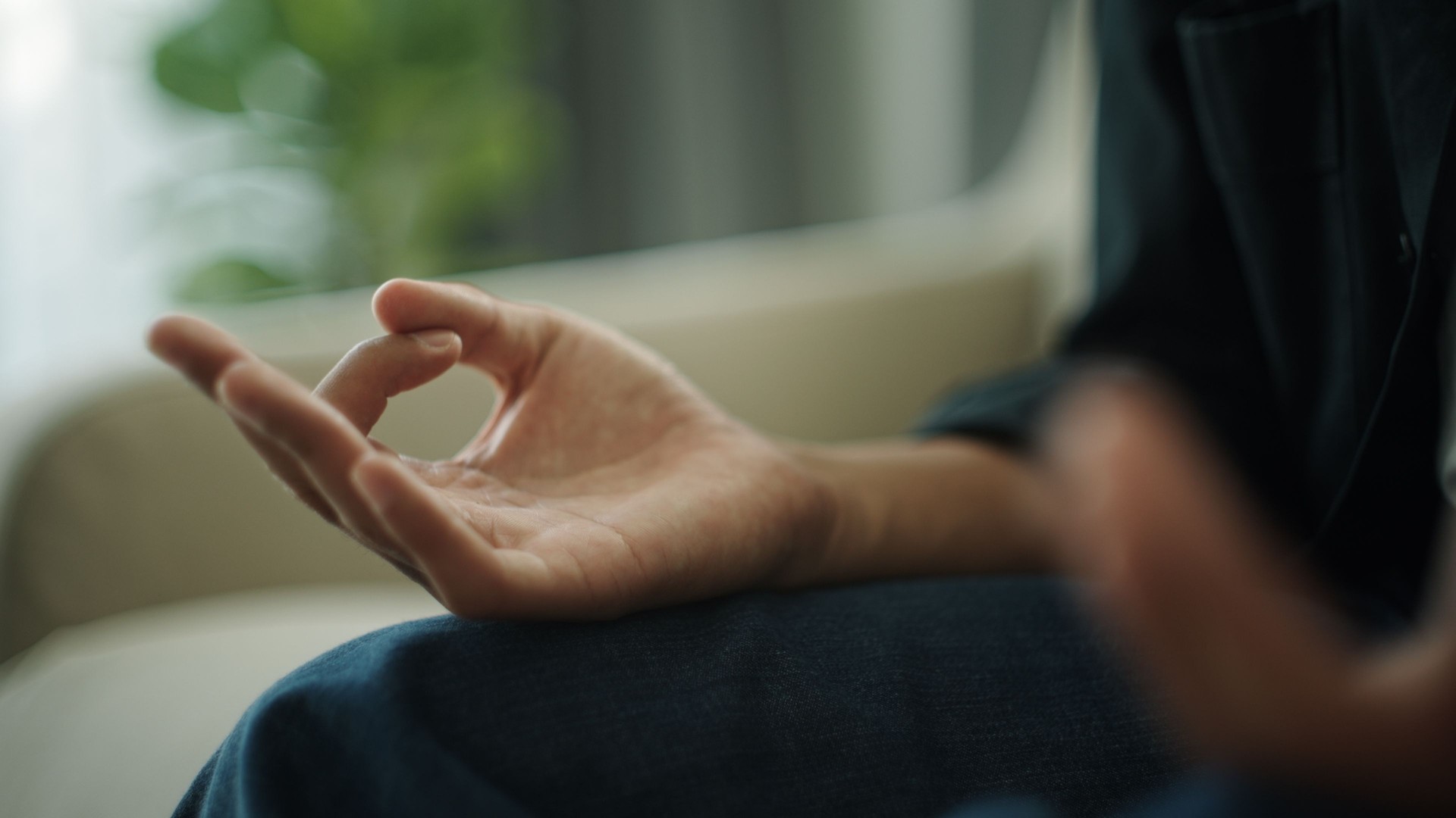 Asian man meditation at home.