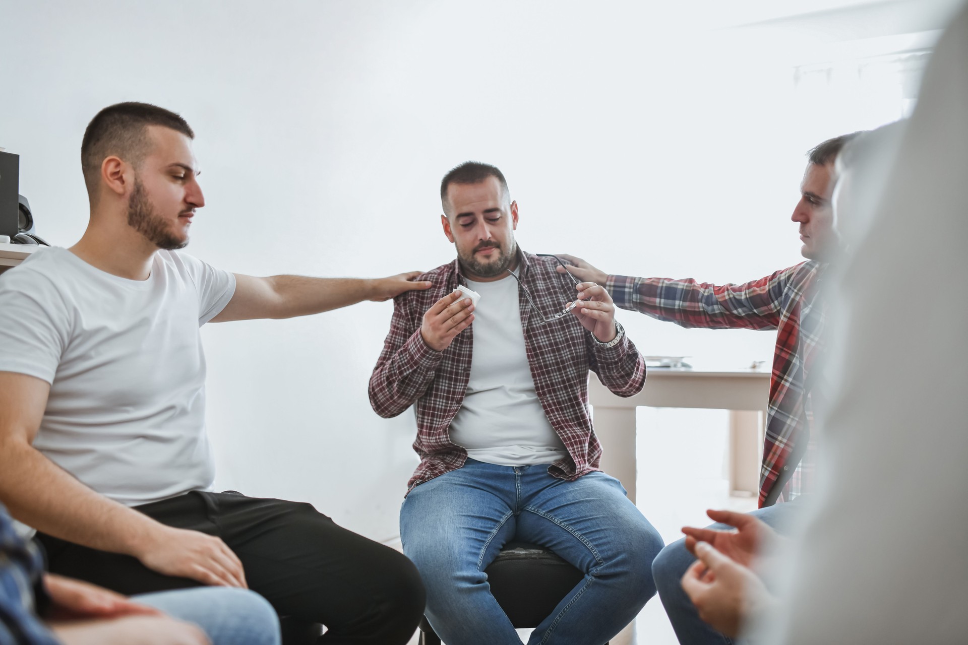 Adult Men Being Honest and Vulnerable in Support Group Sharing His Story With Other Members